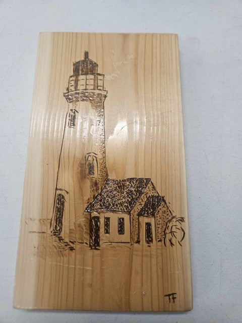 Nature Pyrography Art displayed with hand-burned aquatic themes